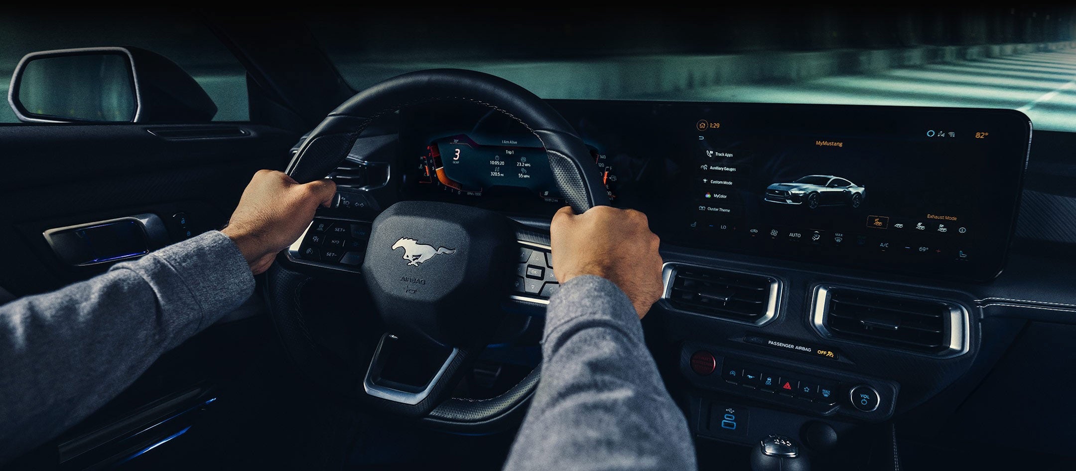 A 2024 Ford Mustang® model interior with a person driving | Wyatt Johnson Ford in Nashville TN